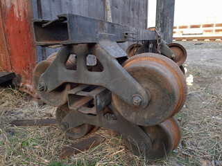 Metal wheels from handcar. An old wheel pair from handcar near the railroad