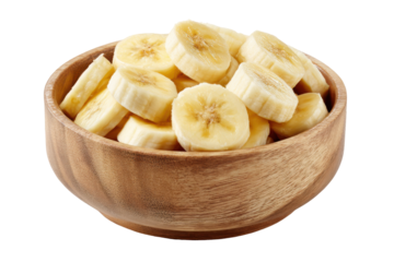 Bowl of sliced bananas isolated on transparent background Sliced banana pieces overflowing from a rustic wooden bowl isolated on white background.