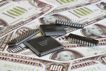 Microchips on US Dollar banknotes. Industry Crisis Concept.