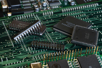 Close up of Microchips on a printed electronic board.