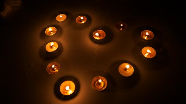 Candlelight Tea Lights Circle Pattern - Warm Glow on Dark Background