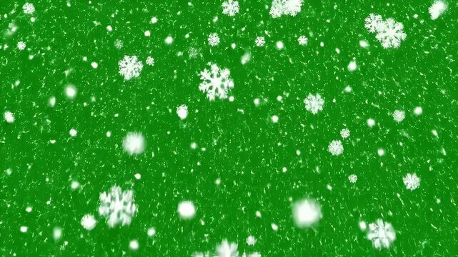 Green Snowflake Background - A green background is covered by many falling white snowflakes of different sizes.