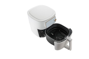 An air fryer with the basket fully removed and placed in front. This view demonstrates the removable components and ease of cleaning.