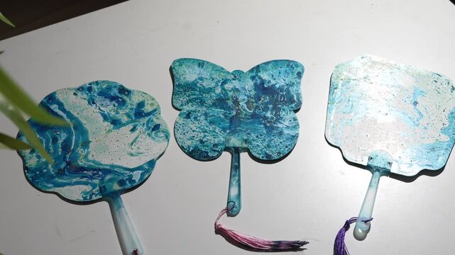 Handcrafted Blue Lacquer Fans with Marbled Finish and Tassels