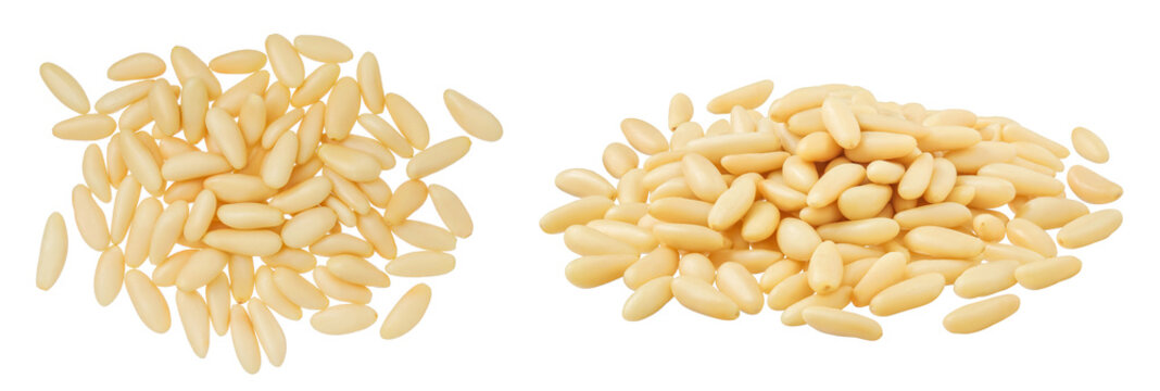 Shelled European pine nuts isolated on white background with full depth of field. Top view. Flat lay