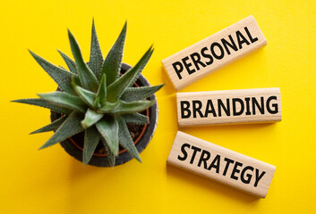 Personal Branding Strategy symbol. Wooden blocks with words Personal Branding Strategy. Beautiful yellow background with succulent plant. Business concept. Copy space.