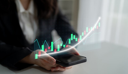 A close-up view of a smartphone in the hands of a business professional displaying a dynamic stock market chart, representing financial trends and growth opportunities. Impute