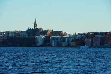 Fototapeta premium Stockholm waterfront skyline with historic buildings and blue sky