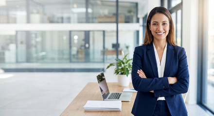 Beautiful hispanic senior business woman with crossed arms smiling at camera. European or latin confident mature middle age leader female businesswoman standing at office workplace, copy space. 