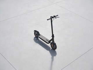 A black scooter is parked on a white surface
