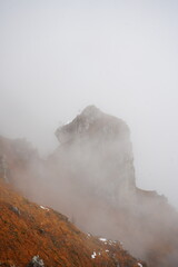 rock in the mountains among the clouds, Italy