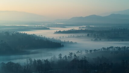 Obraz premium A serene landscape of rolling hills and misty valleys at dawn