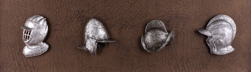 collection of steel knightly protective helmets