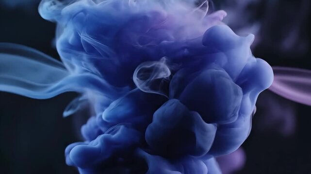 Abstract Blue and Purple Smoke Cloud Explosion Motion Background.