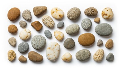 Collection of various smooth rocks and pebbles on white background