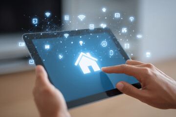 A tablet screen shows a house with a person pointing at it