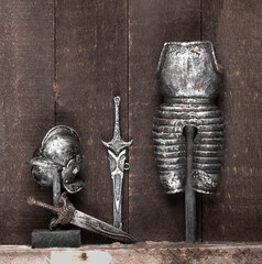 knightly equipment, sword and helmet