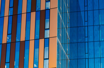 Colorful Modern Glass Building Facade Background. 
