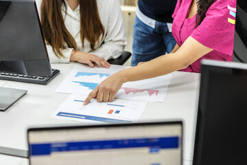 Collaboration among coworkers analyzing data in a modern workspace setting