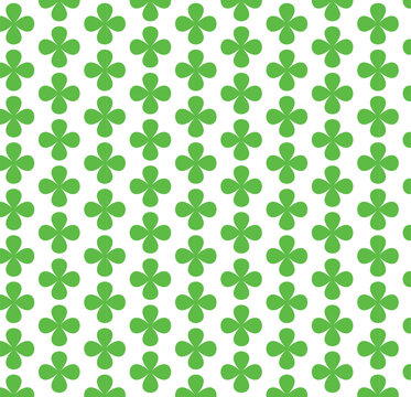 Vibrant green four-leaf clover pattern on a white background creating a lively, cheerful mood. Ideal for festive decor, greeting cards, crafts, textiles, wallpaper,