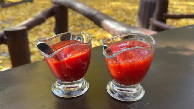 Various hot sauces are on the table in a restaurant, food, chili, ketchup, appendix to the dish, table setting