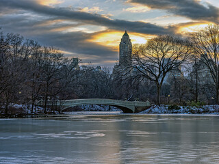 Bow bridge in winter after light snow