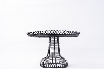 Old metal cake stand isolated