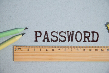 Sticky note with the word "password 123456" on a laptop keyboard. Data protection, password strength concept.