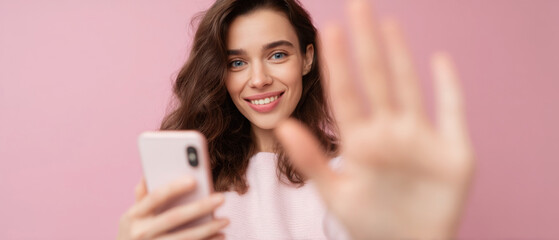 Young vlogger influences fans with engaging content while speaking into smartphone in a vibrant setting