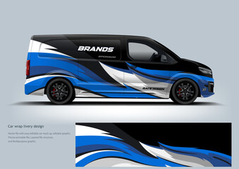 A modern blue and black commercial van wrap combining racing aesthetics with professional branding appeal.