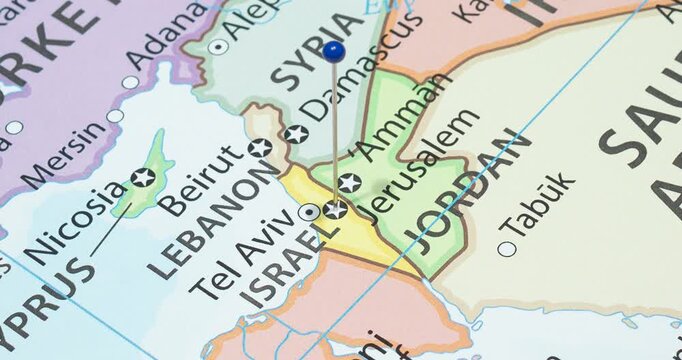 A zoom out of a blue pin into jerusalem city of Israel political map