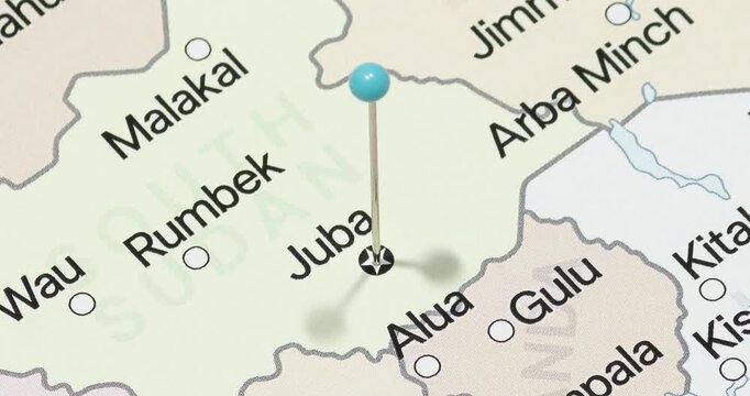 A zoom out of a light blue pin into juba city of south sudan political map