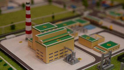 Chimney and piping detail in power plant model with engineer assessment, Gritty industrial scene showcasing power plant with emissions evaluation by engineer with textured stacks