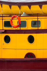 Side of Yellow Tugboat