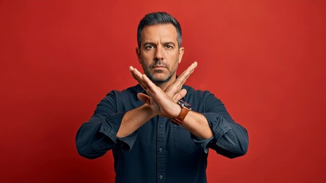 Confident man expressing disagreement and decisionmaking through gestures