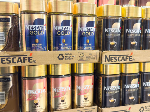 Zagreb, Croatia - December 17, 2025: Nescafe Gold coffee jars arranged neatly on a shelf, showcasing various flavors and packaging, ideal for coffee lovers and retail displays