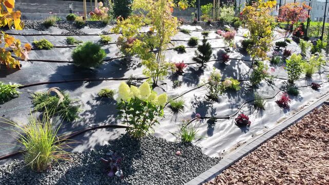 Gardening Techniques for a Sloped Landscape. Irrigation System Installation.