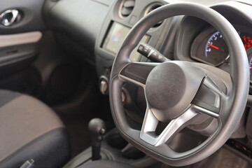 Modern Car Interior with Steering Wheel and Controls