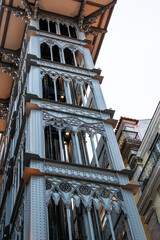 Historic Ornate Elevator Tower with Decorative Ironwork