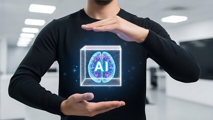 Man holding A I brain hologram in office setting black shirt