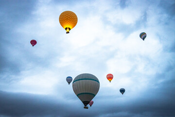 Fototapeta premium hot air balloons, cappadocia, adventure, sunrise, balooning, colourful, rock formations, goreme, turkiye, turkey