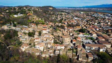 Obraz premium Aerial view around the old town of the city Charmes-sur-Rhone in France on a sunny day in early spring.