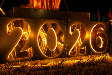 Illuminated 2026 sign with warm lighting