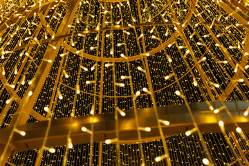 Golden string lights forming dome structure