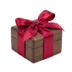 A small wooden gift box with a red ribbon and bow, transparent background