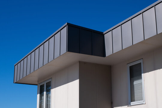 modern home with a flat, square roof