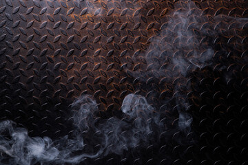 Steel background and smoke. Space for text. Background design concept.