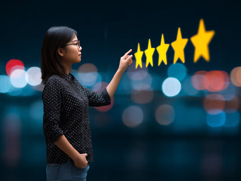Woman placing review star rating on busines