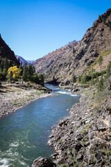 drone photo of Salmon River Canyon upstream from Riggins ID with white sandy beaches and beautiful clear reflection of the canyon walls and blue sky
