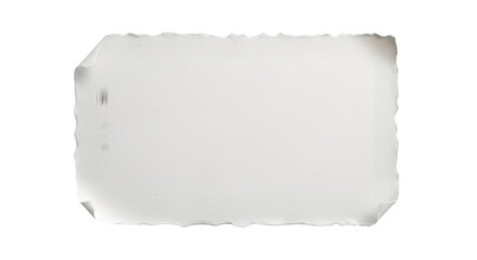 Fototapeta premium Isolated piece of blank white paper with rough torn edges on black background